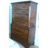 A Georgian mahogany chest on chest, with dentil cornice over two short drawers over three long