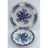 A First Period Worcester plate, decorated in the blue and white Pine Cone pattern, to a shaped edge,