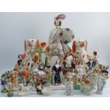 A collection of 19th century Staffordshire figures, to include a pair of seated spaniels, a named