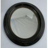 An oval wall mirror, with black frame, overall dimensions 12ins x 10.5ins, mirror dimensions 8.