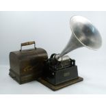 An Edison Gem Phonograph, type 1, in an oak case, with an aluminium horn