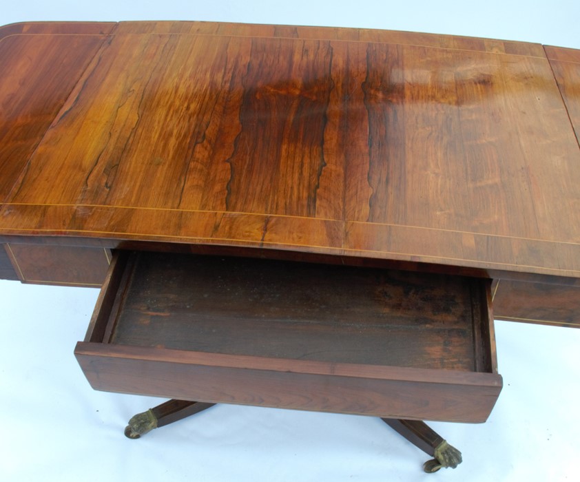 A 19th century rosewood sofa table, with drop flaps, satinwood inlay, fitted with one frieze drawer, - Image 5 of 5