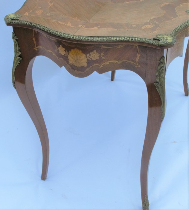 A 19th century style marquetry double serpentine sided centre table, with a central marquetry - Image 4 of 4