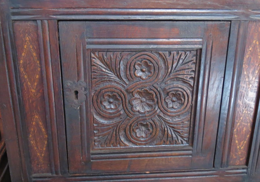 An Antique oak cabinet, the upper section fitted with a shelf over a cupboard, the base fitted - Image 2 of 4