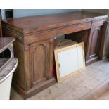 A 19th century mahogany mirror back sideboard, raised on end pedestals, having three frieze