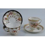 A 19th century Royal Worcester cup and saucer, decorated with flowers to a jewelled border, dated