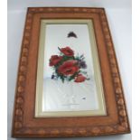 A pair of wall mirrors, the rectangular bevelled glass plate hand painted with a butterfly and