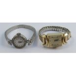 Kenwell, a lady's diamond set mechanical wrist watch, the circular bezel set with single cut