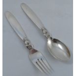 A Georg Jensen silver christening spoon and fork, in the cactus pattern, weight 2oz