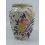 A Poole Pottery vase, decorated with flowers to a white ground, numbered 213, height 9.25ins