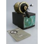 A boxed Policansky Monitor 4B sea fishing reel, with booklet