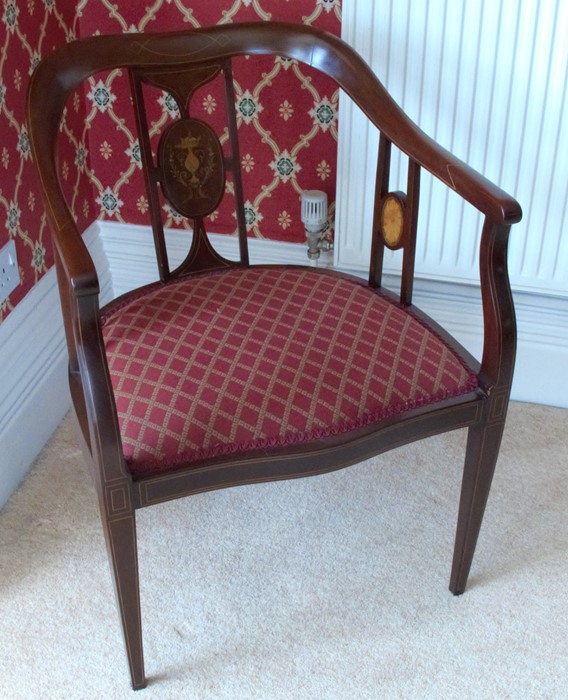 An Edwardian mahogany tub chair, with satinwood stringing and inlaid urn with swags and paterea