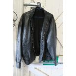 A 1980's vintage black leather jacket, bearing label McNeal, Peek and Cloppenburg