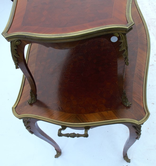 A 19th century kingwood two tier table, with parquetry inlay and gilt metal mounts, the larger table - Image 3 of 4