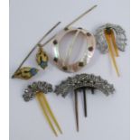 Two cut steel hair combs, together with a paste hair comb, two Victorian gilt metal hair pins and