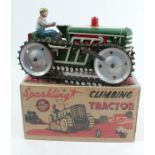 A MAR Toys Sparkling Climbing Tractor, the tin plate clockwork tractor with driver, boxed