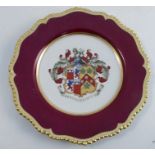 A Flight, Barr & Barr Worcester plate, the centre decorated with an Armorial, to a burgundy border