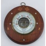 An M.W. Dunscombe Ltd Bristol barometer, set in a mahogany frame with inlaid mother of pearl and