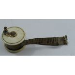 A 19th century bone and metal tape measure