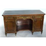 A 19th century mahogany and ormolu mounted desk, the top with leather inset and tooled writing