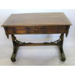 A country made oak centre table, raised on legs and fitted with an assortment of frieze drawers,