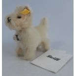 A Steiff plush dog, Treff, height 5ins