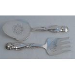 A pair of Georg Jensen silver fish servers, the handles decorated with intertwined fish, weight 9oz