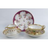 Two 19th century Paris cups and saucers, together with a saucer dish, comprising a floral painted