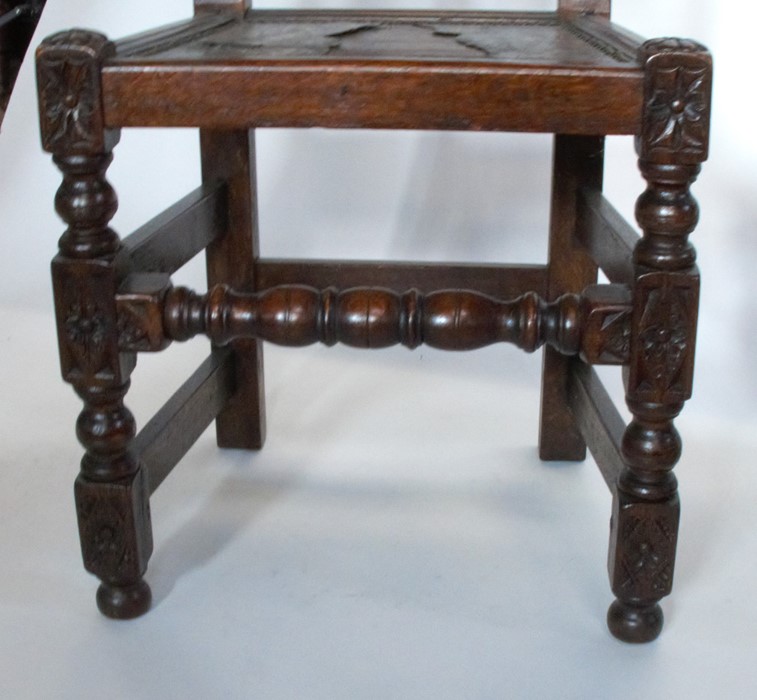 A pair of Antique oak high back chairs, with carved decoration, with leather cover to the solid - Image 4 of 4