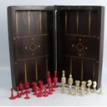 A 19th century folding games box, with inlaid chess board and back gammon, together with a 19th