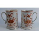 A pair of Chinese tankards, decorated all around with orange foliage, height 6.25insCondition