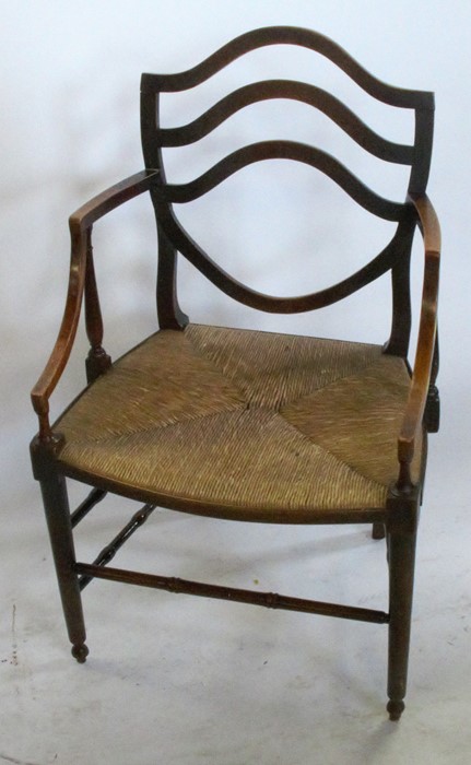 An Antique beech open arm chair, with shield shape back, having a rush seat with turned - Image 3 of 6