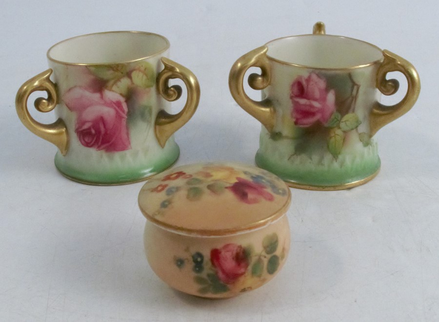 Two miniature Royal Worcester tygs, decorated with pink roses to a green border, shape numbers H282,