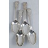 A set of four Victorian silver dessert spoons, decorated in the Queens pattern engraved with an A,
