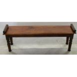 A 19th century mahogany window seat, of rectangular form, raised on turned legs, length 47ins, depth