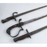 A Remington 1917 bayonet, together with another bayonet and a sword with etched decoration to the