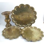 A 19th century India brass tray, of shaped circular form, engraved with court figures, together with