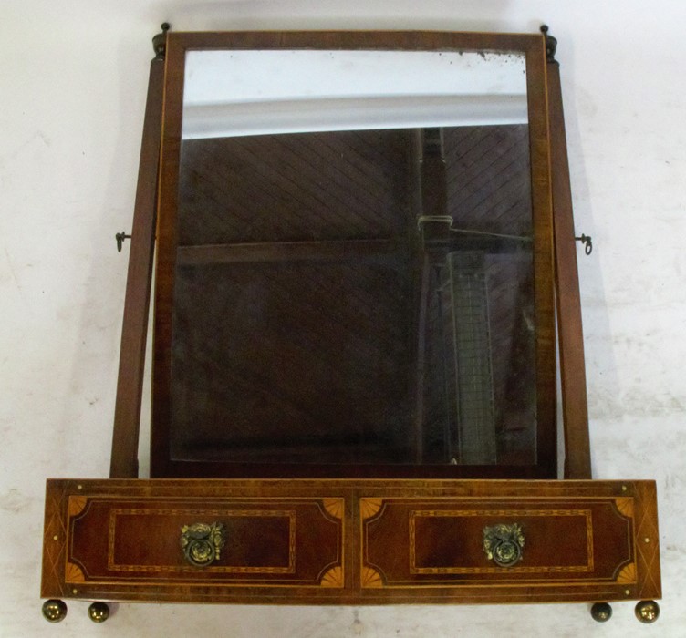 A 19th century mahogany dressing table mirror, the bow front base fitted with two drawers, the whole
