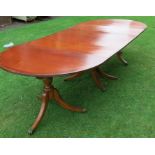 A Regency style mahogany triple pedestal dining table, with D end and two leaves length 114ins,
