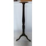 A mahogany torchere stand, with fluted and carved decoration, height 56.5ins