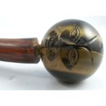 A 19th century walking stick, with tigers eye ball finial carved with a face, height 35ins