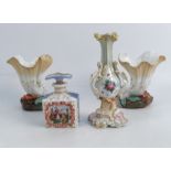 Four 19th century French or Russian porcelain items, comprising a pair of flower-shaped vases,