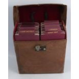 G.W Bacon, London, a leather case containing 30 folding maps of the British Isles, with tabs to