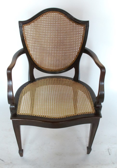 A 19th century mahogany open arm chair, with shield shaped cane back and cane seat - Image 2 of 2