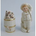 Two Royal Worcester candle snuffers, Cat in a barrel and Boy trying on an oversized coat, height