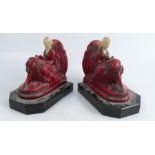 J B Hirsch, A pair of plaster book ends, modelled as seated girls on marble bases, height 5.5ins