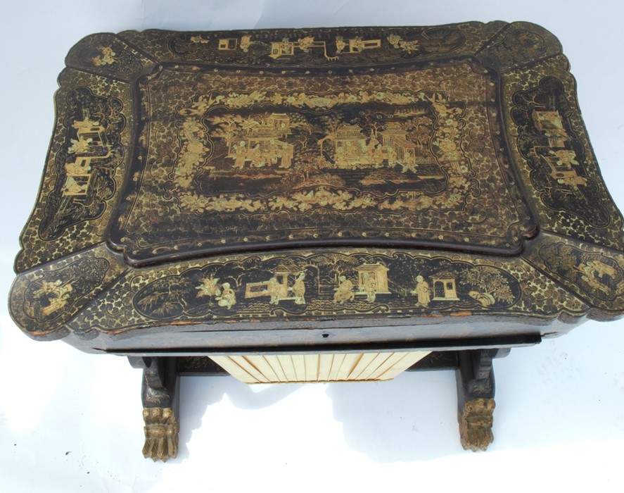 A 19th century papier mache sewing table, decorated in black and gold with Chinoiserie scenes, of - Image 3 of 3