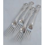 A set of four Georgian silver dessert forks, decorated in a version of Kings pattern with harebells,