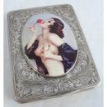 A white metal cigarette case, later applied resin image of a bare breasted woman with a rose,