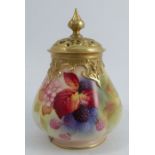 A Royal Worcester quarter lobed covered vase, with pierced gilt cover, the body decorated with